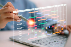 Le chef de projet travaille et mise à jour des tâches avec des jalons et la planification de l'avancement.